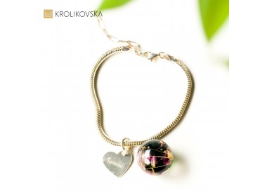 Bransoletka srebrna damska z zawieszkami kwiatowymi.