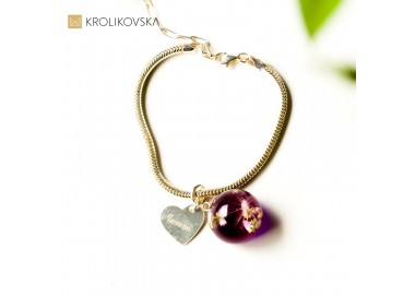 Srebrne bransoletki damskie z grawerowanym sercem.