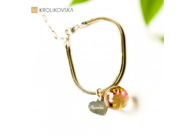 Bransoletka srebrna damska z zawieszkami.