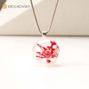 Prezent dla szefowej na pożegnanie kwiat w kuli.